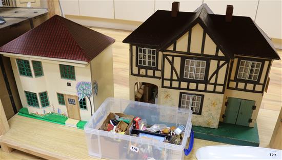 A 1930s Tri-Ang dolls house. No. 61 and another unnamed smaller dolls house,
